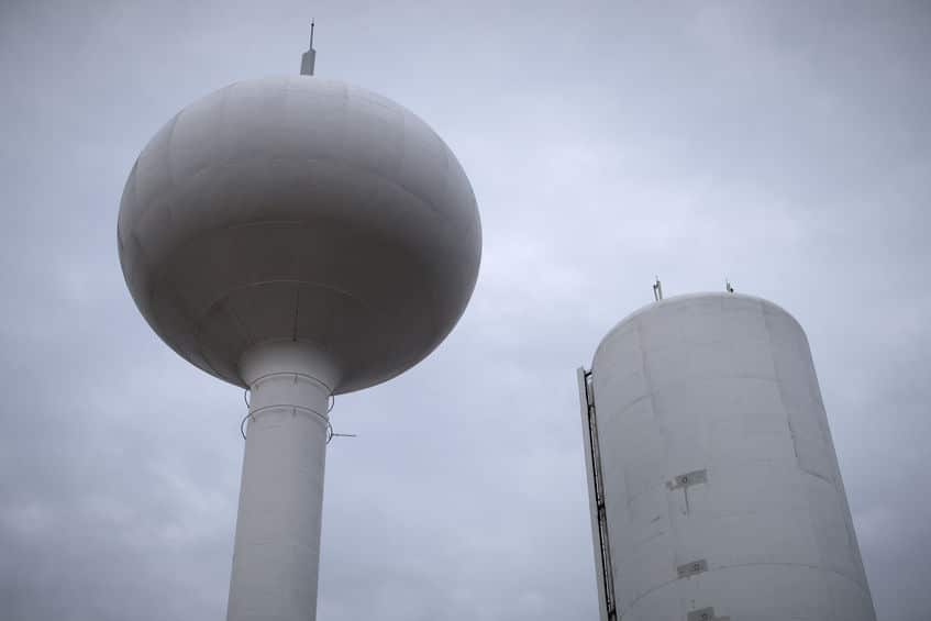 water tank tower aqueduct structure on gray sky